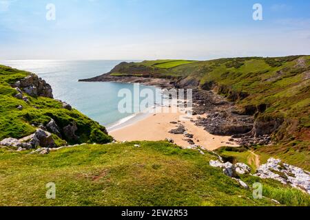 Rocky cliffs at Fall Bay near Worms Head on the western side of the Gower Peninsula near Swansea South Wales UK Stock Photo