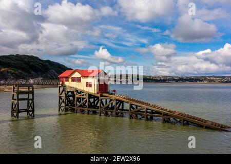 The old RNLI Lifeboat Station on Mumbles Pier on the south east coast of the Gower Peninsula near Swansea in South Wales UK Stock Photo