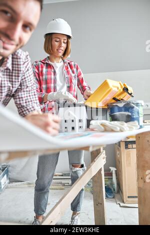 Workwoman and a male engineer working together Stock Photo
