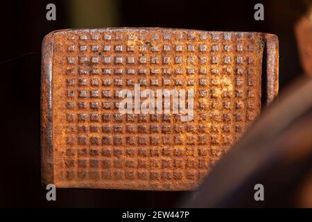 Rusty metal parts belonging to an old abandoned and disused tractor, formerly used in the agronomic industry, near Campo de Borja, Zaragoza province, Stock Photo