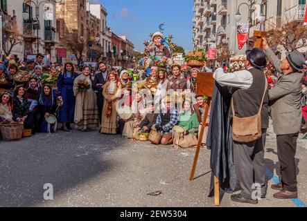 Putignano, Apulia, Italy - February 15, 2015: carnival masks representing Italian peasant population of the past. Stock Photo