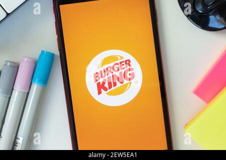 New York, USA - 2 March 2021: Burger King mobile app icon on phone screen, Illustrative Editorial Stock Photo