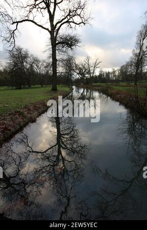 Reflection on La Gueville river - Castle estate - Rambouillet - Yvelines - Ile-de-France - France Stock Photo