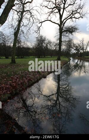 Reflection on La Gueville river - Castle estate - Rambouillet - Yvelines - Ile-de-France - France Stock Photo