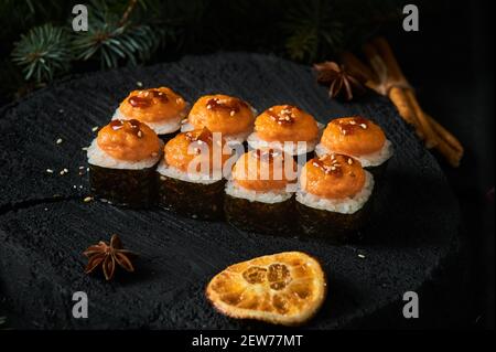 Asian food delivery home, various sushi sets in plastic containers with sauces, rice and chopsticks. Top view, flat lay Stock Photo