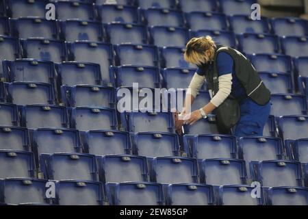 Rome, Italy. 02nd Mar, 2021. Rome, Italy - 02/01/2021: Cleaning ladies clean the stadium empty. The match was not played because 10 Torino players were affected by covid-19 coronavirus infection, Torino did not leave for Rome. at Olympic Stadium in Rome. Credit: Independent Photo Agency/Alamy Live News Stock Photo