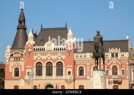 equestrian Statue of Mihai Viteazul and the Greek Catholic Bishop Palace in Union Square, Oradea, Romania Stock Photo