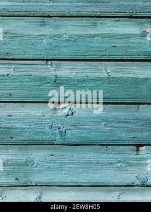 Old wooden wall painted turquoise texture background front view Stock Photo