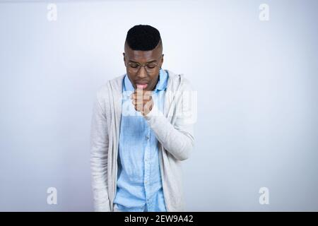 Young handsome african american man wearing casual clothes coughing Stock Photo