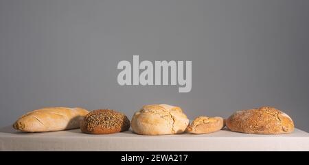 Bread on a table covered with a tablecloth Stock Photo
