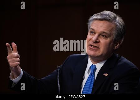 Washington DC, USA. 02nd Mar, 2021. U.S. FBI Director Christopher Wray testifies during a hearing before the Senate Judiciary Committee, on Capitol Hill in Washington, DC, the United States, on March 2, 2021. Christopher Wray said on Tuesday that the law enforcement agency classifies the deadly Jan. 6 Capitol riot by former President Donald Trump's supporters as domestic terrorism. (Graeme Jennings/Pool via Xinhua) Credit: Xinhua/Alamy Live News Stock Photo