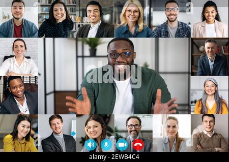 Webcam computer screen view at multiracial diverse business people group, involved in video conference, online meeting, using video call app, virtual online briefing concept Stock Photo