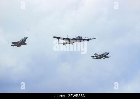 three warbirds in flight over Duxford Stock Photo