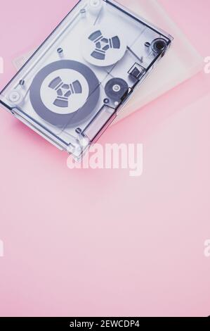 A data storage magnetic tape isolated in the pink background with a copy space Stock Photo