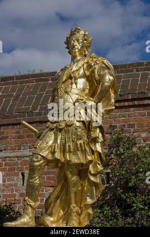 A golden statue of King George III dressed as a Roman Emperor. On public display in Portsmouth, Hampshire. Stock Photo