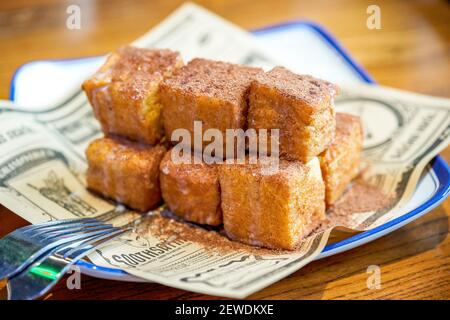 Classic dessert of Hong Kong tea restaurant, deep-fried western toast with condensed milk and peanut sauce Stock Photo