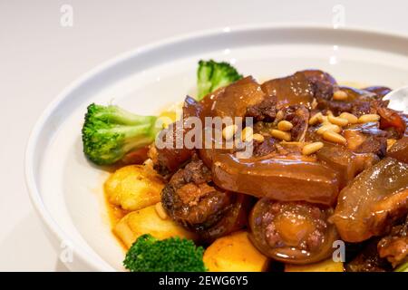 A delicious Chinese Cantonese dish with oxtail stewed in sauce Stock Photo