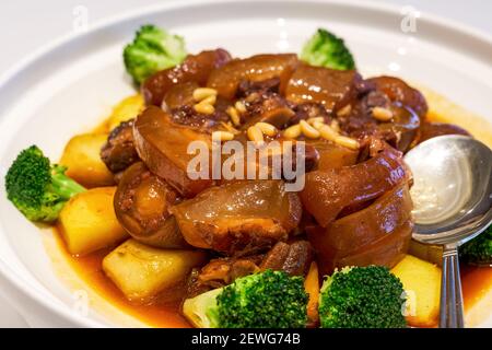 A delicious Chinese Cantonese dish with oxtail stewed in sauce Stock Photo