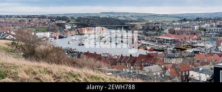 WHITBY, NORTH YORKSHIRE - MARCH 15, 2010:  Panorama view of the town and harbour Stock Photo