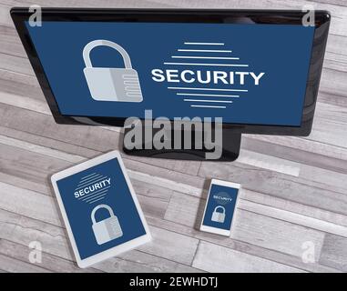 Security concept shown on different information technology devices Stock Photo