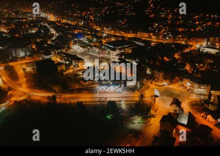 An aerial  beautiful Tuzla cityscape in Bosnia and Herzegovina at night Stock Photo
