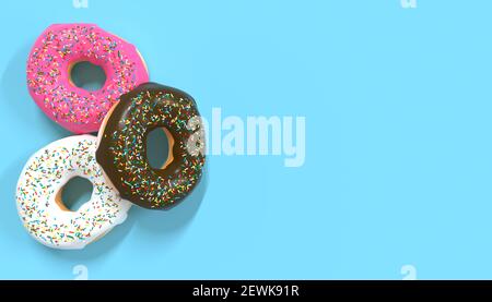 multicolored sweet donuts with sprinkles on blue background Stock Photo