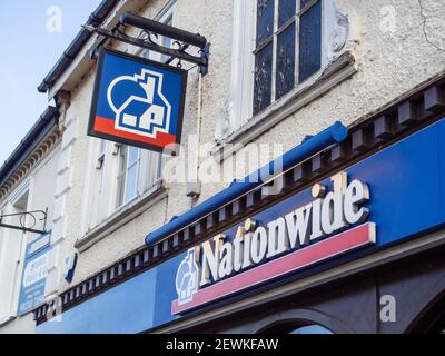 Sign and logo for the Nationwide Building Society above a branch office in Olney, Buckinghamshire, UK Stock Photo