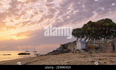 Sunrise on the Saint Pierre point on La plage des Dames in Noirmoutier island, Vendée, France Stock Photo