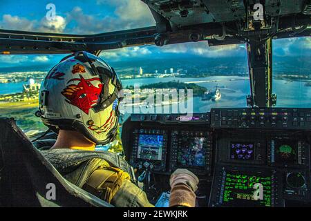 PEARL HARBOR (Dec. 21, 2020) U. S. Marine Corps Capt. Brendon Connor, a pilot assigned to Marine Medium Tiltrotor Squadron (VMM) 268, flies his MV-22