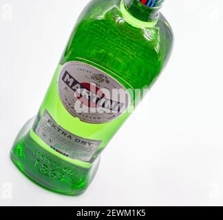 KYIV, UKRAINE - JANUARY 06, 2021: Martini Extra Dry bottle closeup, a famous Italian vermouth is the world's fourth most powerful alcoholic brand prod Stock Photo