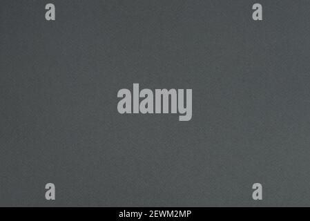 Gray paper background. Iron gray colour paper texture. Matte monochrome surface. Stock Photo