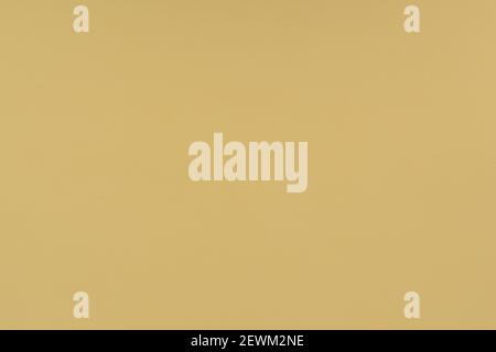 Yellow paper background. Mellow yellow colour paper texture. Matte monochrome surface. Stock Photo