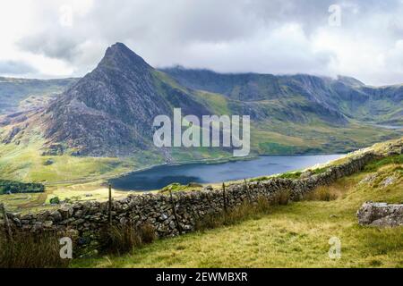 High view across Ogwen Valley to Mount Tryfan and Llyn Ogwen lake from the Carneddau mountains in Snowdonia National Park Conwy North Wales UK Britain Stock Photo