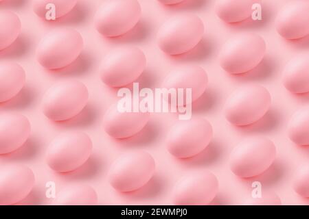 Pattern made of eggs on pastel pink background, minimal easter concept Stock Photo