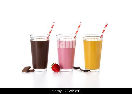 Chocolate, strawberry and vanilla milkshakes isolated on white background Stock Photo