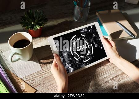 CRM - customer relationship management system concept on screen Stock Photo