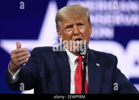Orlando, United States. 28th Feb, 2021. Former President Donald Trump addresses attendees at the 2021 Conservative Political Action Conference (CPAC) at the Hyatt Regency. The four day gathering of conservatives, usually held in the Washington, DC area, was relocated to Florida this year where Gov. Ron DeSantis has imposed fewer COVID-19 restrictions. Credit: SOPA Images Limited/Alamy Live News Stock Photo