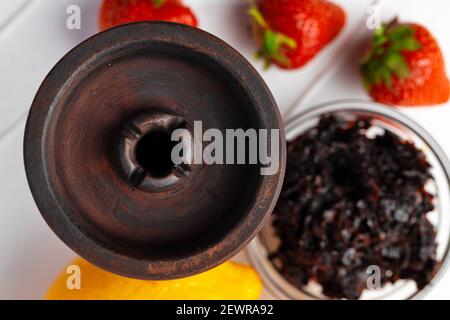 Empty hookah shaft close up on table with fresh fruit Stock Photo