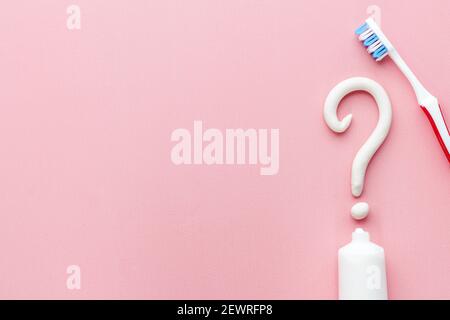 Question Mark With Toothpaste Question mark of toothpaste with toothbrush, top view. Oral care and ...