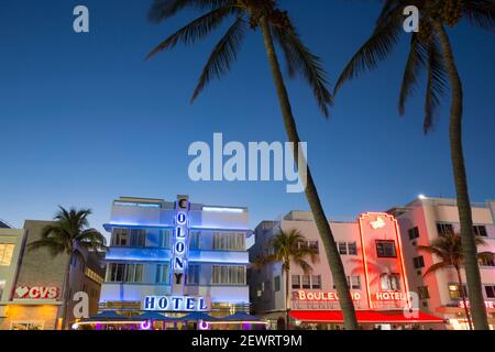 Colourful hotel facades illuminated by night, Ocean Drive, Art Deco Historic District, South Beach, Miami Beach, Florida, United States of America Stock Photo