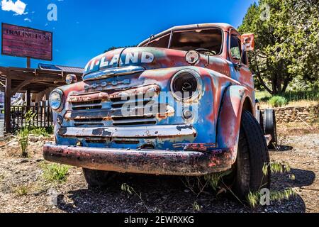 An antique Dodge pick up truck is found parked in front of the Zion Mountain Trading Company just outside Zion National Park in Utah. Stock Photo