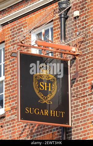 Close up sign outside old White Hart pub in Brentwood now rebranded as Sugar Hut nightclub & restaurant featured in reality TV series Towie Essex UK Stock Photo