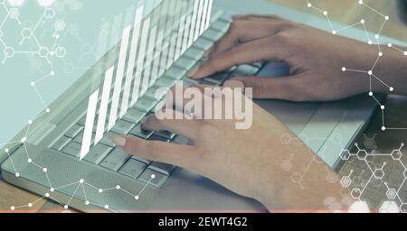 Financial data processing over woman using laptop Stock Photo