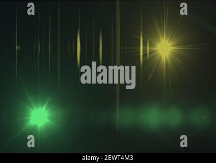Glowing green and yellow spots of light with light trails in background Stock Photo