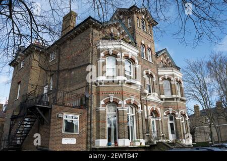 carisbrooke house, a victorian gothic style house, now divided into  apartments, in east twickenham, middlesex, england Stock Photo