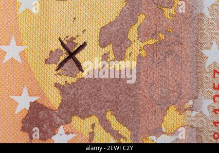 Brexit (detail of a 50 euro note with X drawn on UK map)