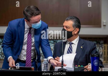 Democratic Senator from California Alex Padilla talks with an aid prior to the Senate Homeland Security and Governmental Affairs/Rules and Administration hearing to examine the January 6, 2021 attack on the US Capitol on Capitol Hill in Washington, DC, USA, 03 March 2021. Photo by Shawn Thew/Pool/ABACAPRESS.COM Stock Photo