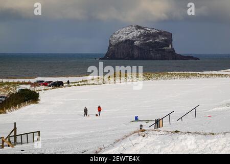 Snow on Glen Golf Course with Bass Rock in background Stock Photo