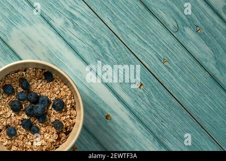 Breakfast healthy granola in a bowl. Can be used as a background, backdrop, texture. Stock Photo