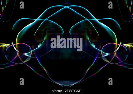 PL00017-00...WASHINGTON - A mirror montage of a giant soap bubbles floating in the wind at the Edmonds Marina on the Salish Sea. Stock Photo